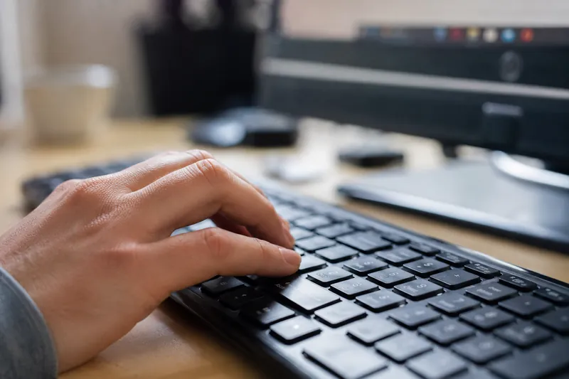 Hand on keyboard